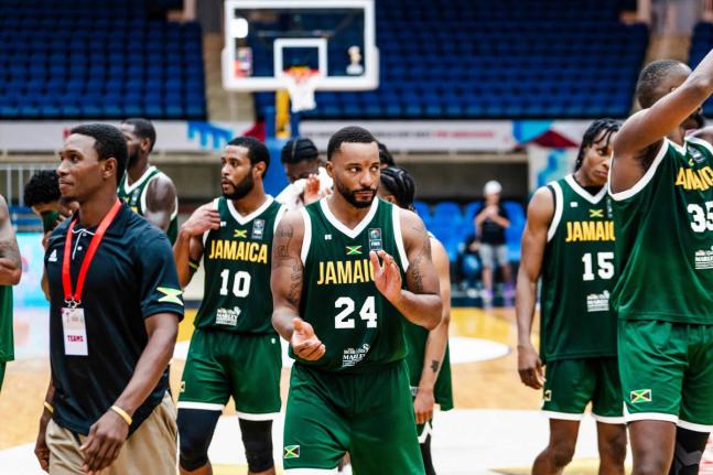 Jamaica and Miami Heat player Norman Peart tries to motivate his players during a FIBA Basketball 
pre-qualification competition recently. 