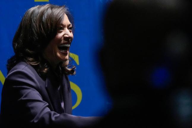 Former United States Vice President Kamala Harris greets people before she speaks on October 17, 2025, in Birmingham, Alabama. 
