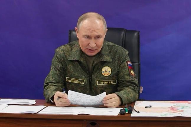 In this image made from video released by the Russian Presidential Press Office on October 26, 2025, Russian President Vladimir Putin speaks while visiting one of the command posts of the Joint Group of Forces. 
