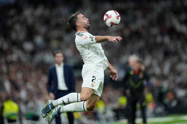 Real Madrid’s Dani Carvajal receives the ball during the La Liga football match between Real Madrid and Villareal in Madrid, Spain, on October 5, 2024. 
