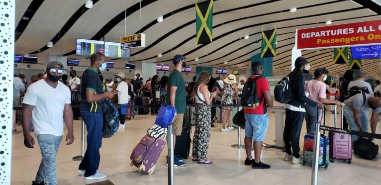 Tourists in the departure area at the Sangster International Airport in Montego Bay. - File photo.