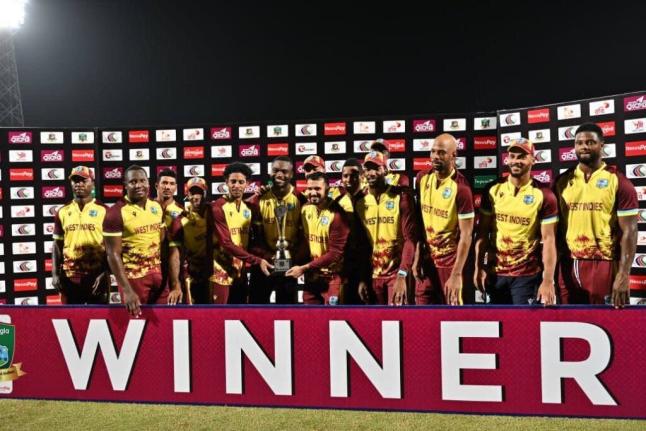 The West Indies pose with the winners’ trophy after whitewashing Bangladesh in their T20I series. 
