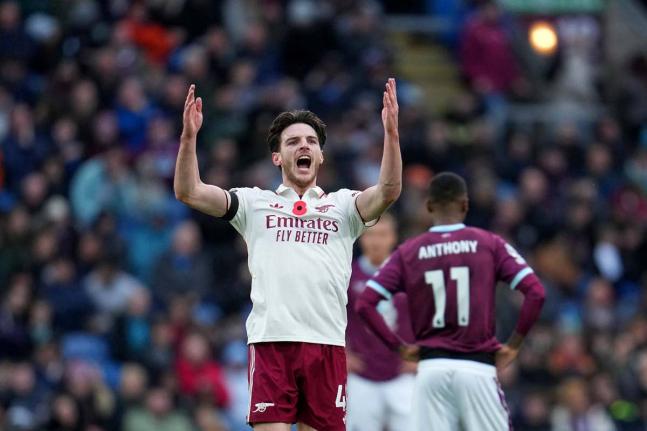 Arsenal’s Declan Rice celebrates after scoring his side’s second goal during the English Premier League soccer match against Burnley in Burnley, England, yesterday. Arsenal won 2-0.