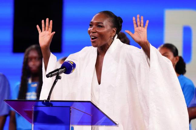 Venus Williams speaks during a ceremony at Arthur Ashe Stadium between matches during the women’s singles semifinals of the US Open tennis championships on September 4 in New York. 
