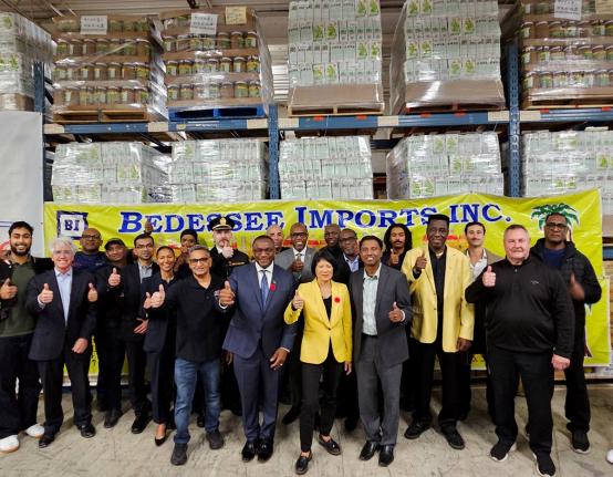 Thumbs up! Front row: Carlos Maharaj, treasurer of United Trinbago West Indian Association (UNI-TnT), Councillor Michael Thompson, Mayor Olivia Chow, and Councillor Neethan Shan with representatives of the Jamaican Canadian Association, Consulate General o