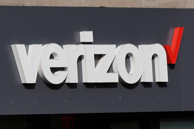 
A Verizon sign is displayed on a store, September 30, 2025, in Cambridge, Massachusetts. 