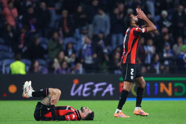 Nice’s Morgan Sanson (left) and Ali Abdi react at the end of the Europa League opening phase football match against FC Porto in Porto, Portugal on Thursday, November 27.