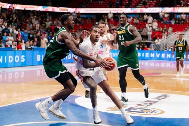 FIBA Americas World Cup qualification action between Jamaica and Puerto Rico at the Coliseo Roberto Clemente in San Juan, Puerto Rico, on Monday.