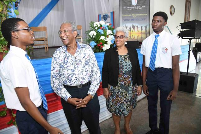From left: Student Cameron Shepherd engages with founder of C.H.E.W. Foundation, Donovan Lewis, Margaret Campbell, principal of St George’s College, and student Nathaniel Farquharson, at the St George’s College Lecture Series held on Tuesday at the Abe