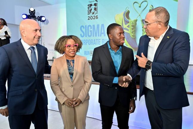 Oblique Seville (second right), Jamaica’s 100 metres world champion and one of the patrons for next year’s Sagicor ‘Run for the West’,  with (from left) Christopher Zacca, president and CEO of Sagicor Group and chairman of Sagicor Foundation; Senat