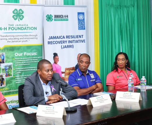 Minister of Agriculture, Fisheries and Mining, Floyd Green (left), addresses a press briefing on the Jamaica Resilient Recovery Initiative on December 3, 2025, at the Jamaica 4‑H Clubs’ Kingston and St Andrew office on Duke Street in Kingston. Lookin