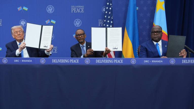 United States President Donald Trump, Rwanda's President Paul Kagame and Democratic Republic of Congo President Felix-Antoine Tshisekedi, during a signing ceremony at the Donald J. Trump Institute of Peace on December 4, 2025, in Washington. 