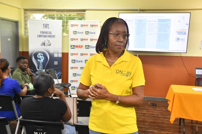 Rose Miller, financial education consultant with the JN Foundation, addressing students at The Mico University College.