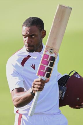 West Indies’ Justin Greaves raises his bat after scoring 200 runs against New Zealand on day five of their Test match in Christchurch, New Zealand, on Saturday.