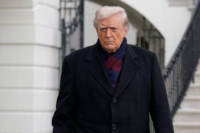 President Donald Trump talks to reporters as he departs from the South Lawn of the White House, Saturday, December13, 2025, in Washington, en route to Baltimore to attend the Army-Navy football game. (AP Photo/Jose Luis Magana)