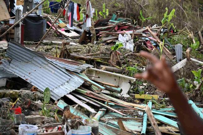 Mangled remains of a house in Westmoreland flattened by Hurricane Melissa.