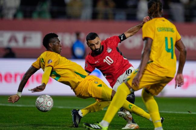 Egypt’s Mohamed Salah scores during the Africa Cup of Nations Group B match against Zimbabwe in Agadir, Morocco, yesterday.