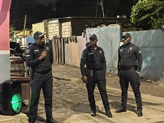 Divisional Commander for St Andrew South Police Division, Senior Superintendent Damion Manderson, along with members of his community safety and security team, at a street meeting at the corner of Water Street and Fitzgerald Avenue in St Andrew on December