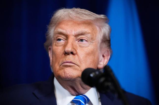 President Donald Trump attends a joint news conference with Ukraine's President Volodymyr Zelenskyy following a meeting at Trump's Mar-a-Lago club, Sunday, December 28, 2025, in Palm Beach, Fla. (AP Photo/Alex Brandon)