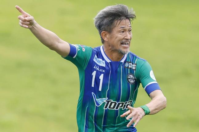 Japanese forward Kazuyoshi Miura of Suzuka plays in a JFL football match against Oita in Suzuka, central Japan, on July 14, 2024. 