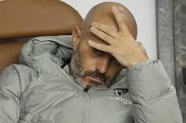 Chelsea’s head coach Enzo Maresca sits on a bench ahead of the Champions League opening phase match between Qarabag and Chelsea in Baku, Azerbaijan, on November 5, 2025.