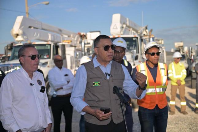 Prime Minister Dr Andrew Holness speaking at a ceremony on January 2, 2026 for the arrival of 150 specialised trucks to be deployed by the Jamaica Public Service for Hurricane Melissa electricity restoration.