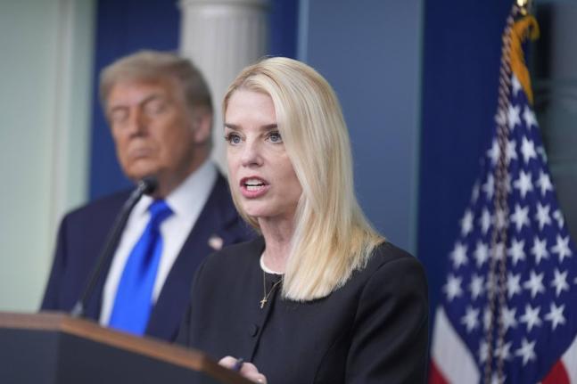 Attorney General Pam Bondi speaks to the media, Friday, June 27, 2025, in the briefing room of the White House in Washington, as President Trump looks on. (AP Photo/Manuel Ceneta)
