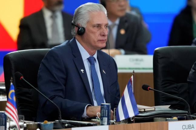 Cuba's President Miguel Diaz-Canel attends the 17th annual BRICS summit in Rio de Janeiro, Sunday, July 6, 2025. (AP Photo/Eraldo Peres)