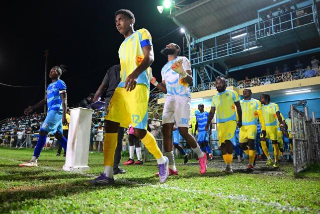 Waterhouse FC players take to the Drewsland field during a Jamaica Premier League match against Molynes United on December 28,2025.