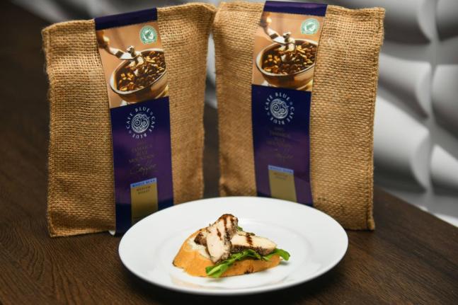 The coffee-glazed jerk chicken breast is served as a crostini and topped with a coffee balsamic sauce.