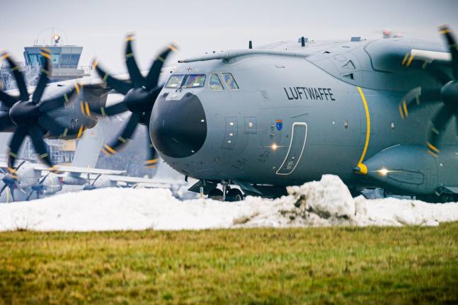 An Airbus A400M transport aircraft of the German Air Force taxis over the grounds at Wunstorf Air Base in the Hanover region, Germany, Thursday, as troops from NATO countries, including France and Germany, are arriving in Greenland to boost security. 
