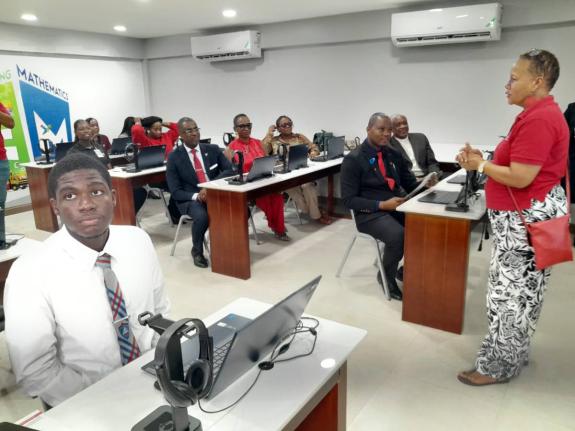Coleen Lyn (right),vice-president, Colfax Mart Ltd, a division of Digicel, outlines features of the SMART Lab to teachers and students following its presentation to Sam Sharpe Teachers’ College recently. 