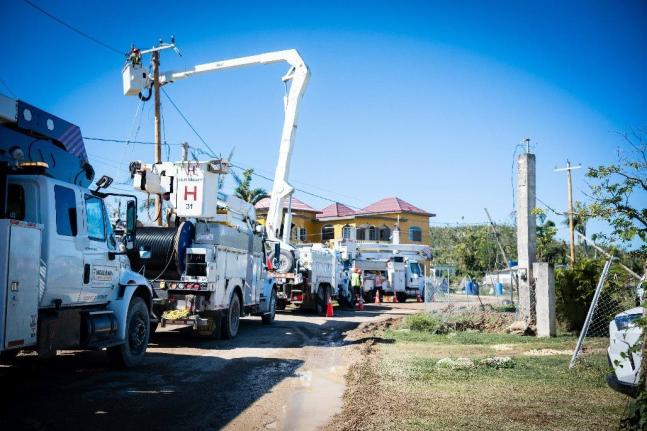 Several bucket trucks seen on Carawina Road in Westmoreland as JPS continued several kilometres of repair work along the power line section leading to the National Water Commission’s Roaring River Pump. The energization of the lines aims to restore water