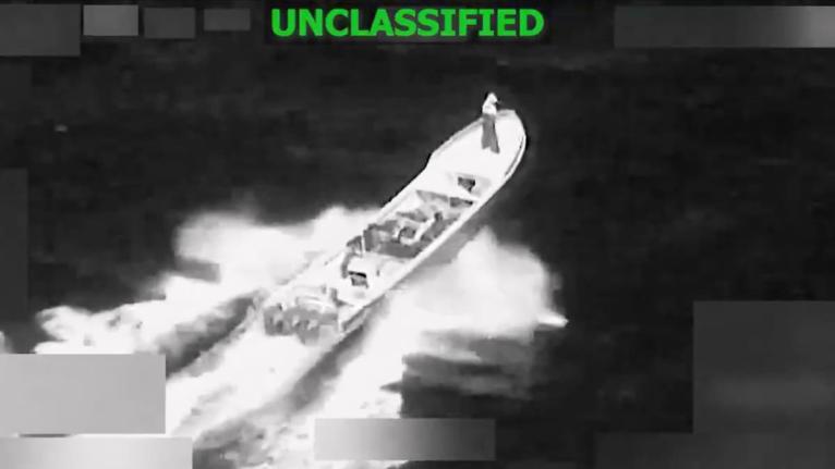 This image from video provided by US South Command, shows a vessel accused of trafficking drugs in the eastern Pacific Ocean shortly before it was destroyed by the US military, killing two and injuring one, on January 23, 2026. (U.S. Southern Command via A