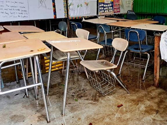 Hurricane Melissa damage to a classroom at a school.