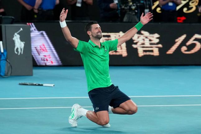 Novak Djokovic of Serbia celebrates after defeating Jannik Sinner of Italy in their semifinal match at the Australian Open tennis championship in Melbourne, Australia, early Saturday, January 31, 2026.