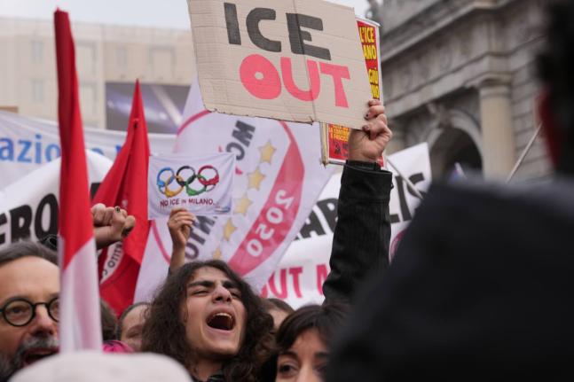 
A person holds a sign, during an anti-ICE demonstration, ahead of the 2026 Winter Olympics, in Milan, Italy, yesterday.