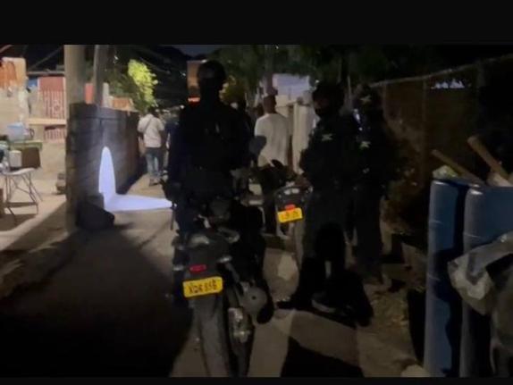 Police at the scene of a shooting along Chisholm Avenue in St Andrew on February 6.