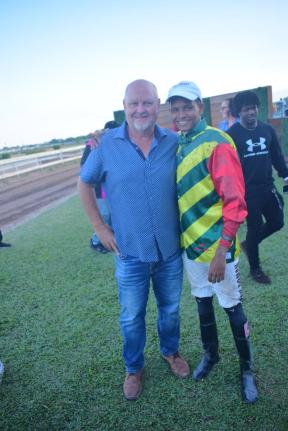 Winning trainer Anthony Nunes (left) and jockey Raddesh Roman in the winner’s enclosure after BARNABY won the Lloyd Linbergh ‘Lindy’ Delapenha Memorial  Trophy over a mile at Caymanas Park yesterday.