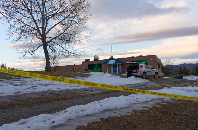 Police began putting tape out near the Tumbler Ridge Secondary School and surrounding buildings in Tumbler Ridge, British Columbia on February 11, 2026.