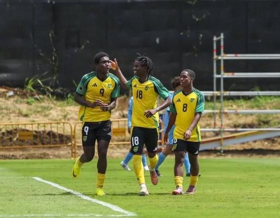  Jamaica Under-17’s Kelvin D Brown (left) celebrates after scoring a goal against Aruba with teammates Jude Royes (centre)  and Jaheem Bennett during their Concacaf U17 Qualifier at the Costa Rica Football Federation field on Friday, February 6.