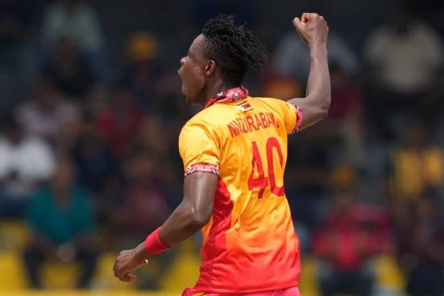 Zimbabwe’s Blessing Muzarabani celebrates the wicket of Australia’s Tim David during the T20 World Cup cricket match between Australia and Zimbabwe in Colombo, Sri Lanka, yesterday.