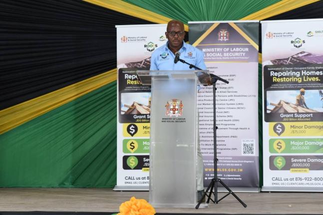 Pearnel Charles Jr, minister of labour and social security, addressing beneficiaries under the Restoration of Owners or Occupants Family Shelter programme at Sean Lavery Faith hall in Savann-la-Mar, Westmoreland, on Thursday. 