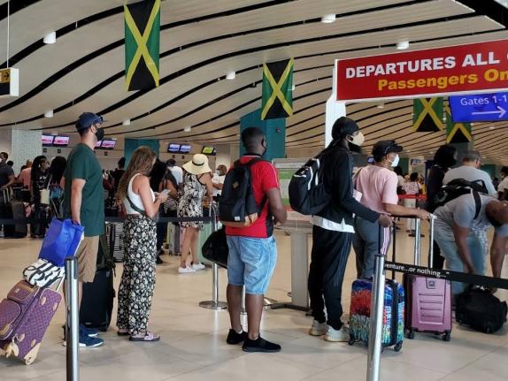 Passengers at the Sangster airport in St James. - File photo