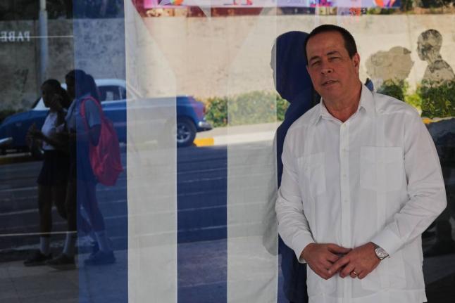 Cuba's Minister of Health, José Ángel Portal Miranda, poses at the ministry's entrance in Havana, Friday, February 20, 2026. (AP Photo/Ramon Espinosa)