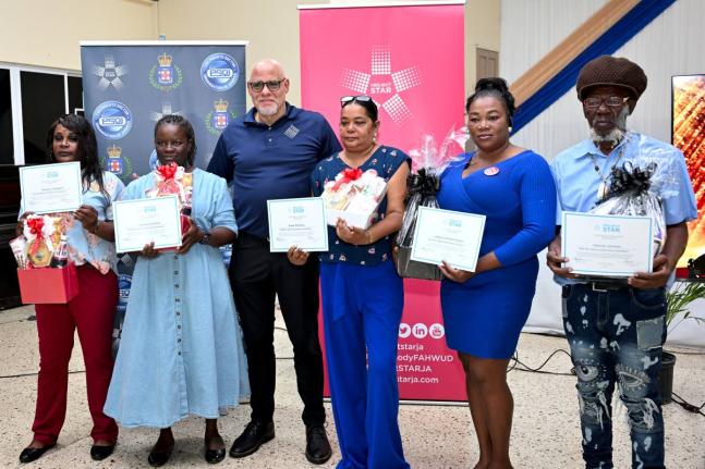 (From left) Kemecia Chambers, Andrea Archibald, Diane McClune, Latoya Coleman-Morgan and Derrick Johnson are presented with certificates and gift baskets courtesy of Scotiabank and Carreras, honouring their outstanding service and leadership in the May Pen