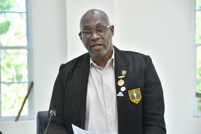 Chief Public Health Inspector for Westmoreland, Steve Morris, delivering remarks during the Westmoreland Municipal Corporation’s recent monthly meeting in Savanna‑la‑Mar.