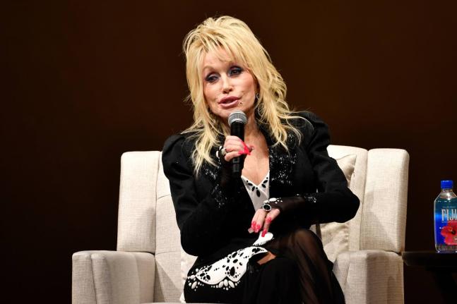 Dolly Parton speaks to a audience gathered to celebrate the expansion of the Imagination Library of Kentucky at the Lyric Theatre in Lexington, Kentucky on August 27, 2024. 