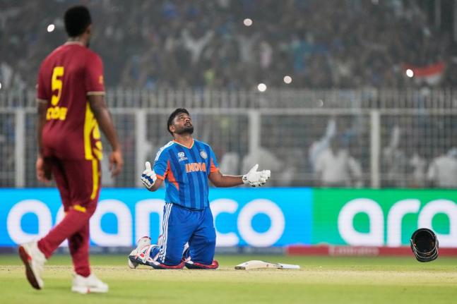 India's Sanju Samson looks to the heavens after India won the T20 World Cup cricket match against West Indies in Kolkata, India on March 1, 2026. (AP Photo/Bikas Das)