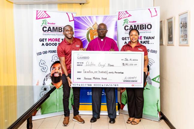 Romario Creary (left), head of FX Trader Cambio and Calecia Robinson, FX Trader’s marketing manager, flank Bishop Leon Golding of the Diocese of Jamaica and the Cayman Islands, operators of the Clifton Boys’ Home.